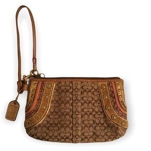 Coach brown mini signature c embellished wristlet bag